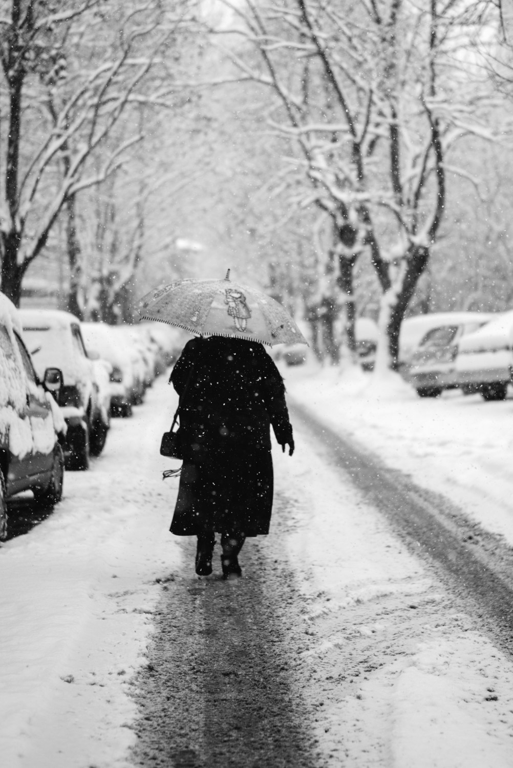 High contrast woman with umbrella