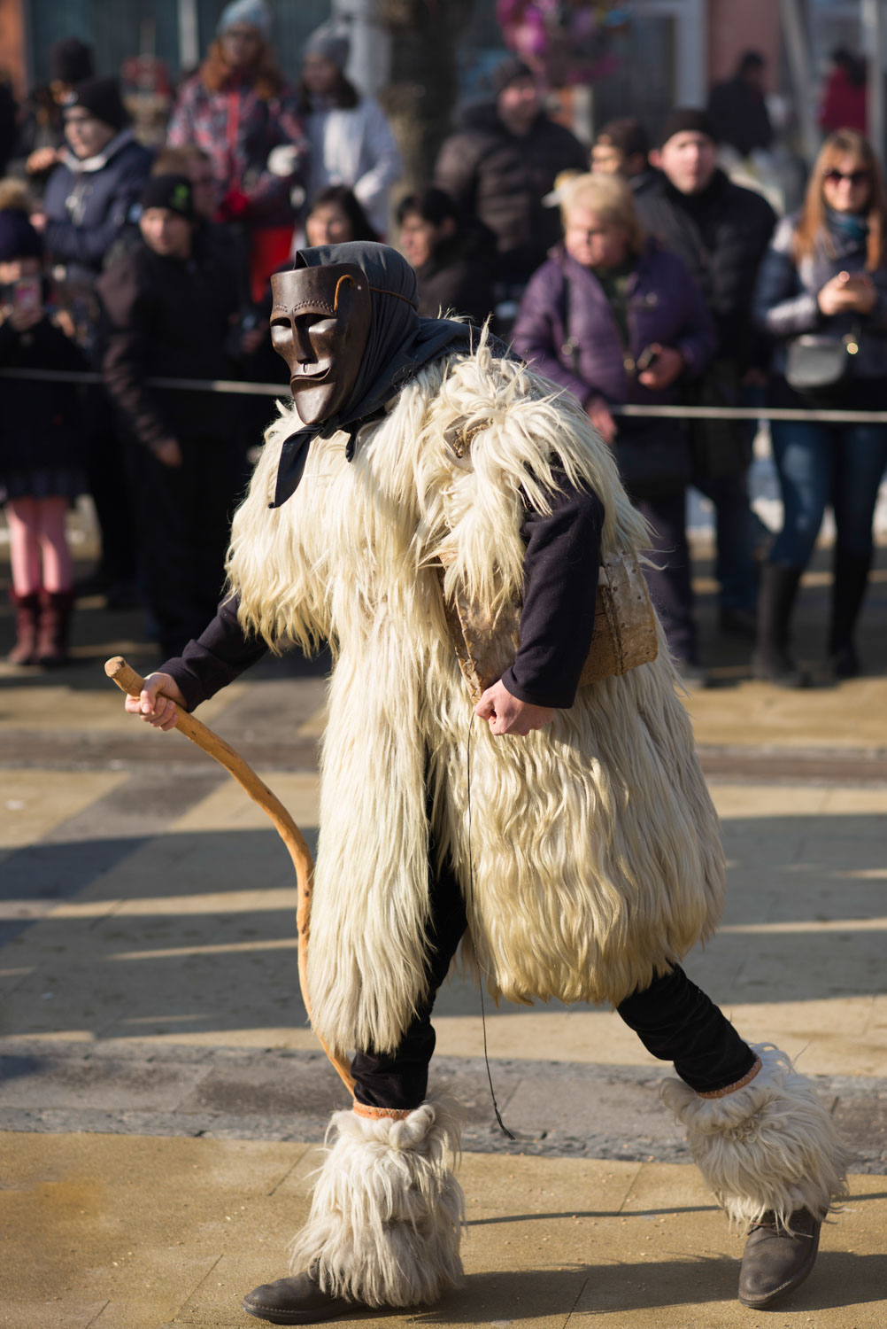 A masked man at Surva