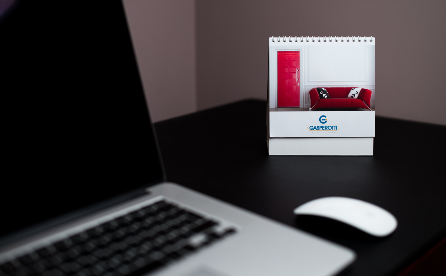 Pyramid type desk calendar with 3 mini calendars on top, and a picture on the back.